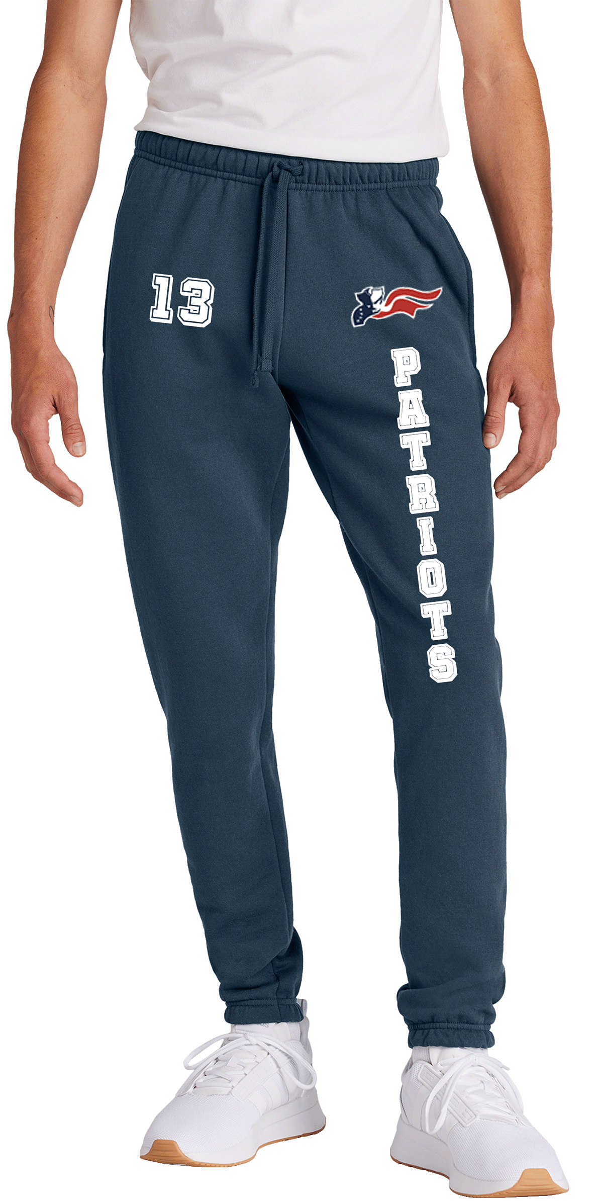 A pair of gray fleece sweatpants with 'Patriots' written on the side in a blue and red color scheme, consistent with a sports team branding.