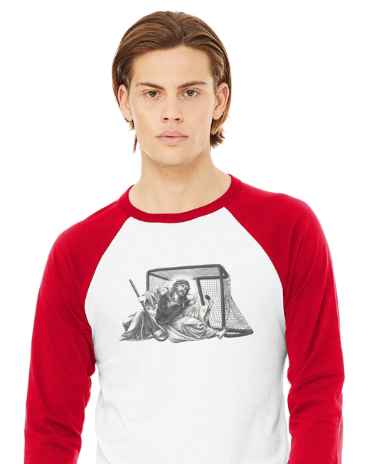 Person wearing a red and white baseball shirt with graphic design on a white background