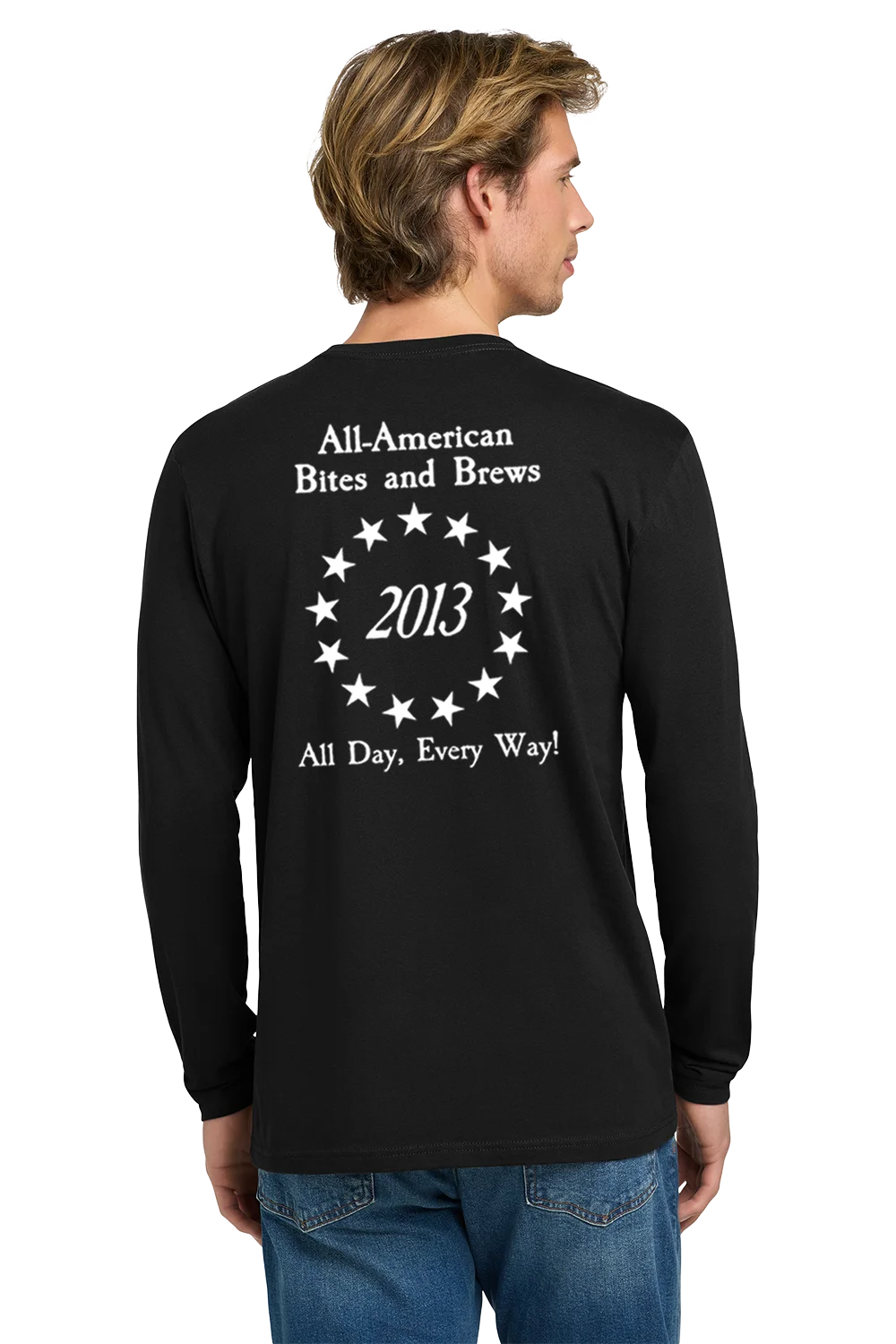 Person wearing a black long-sleeve shirt with text on the back, standing against a white background. Paper Street Print Co, Blairstown, NJ,