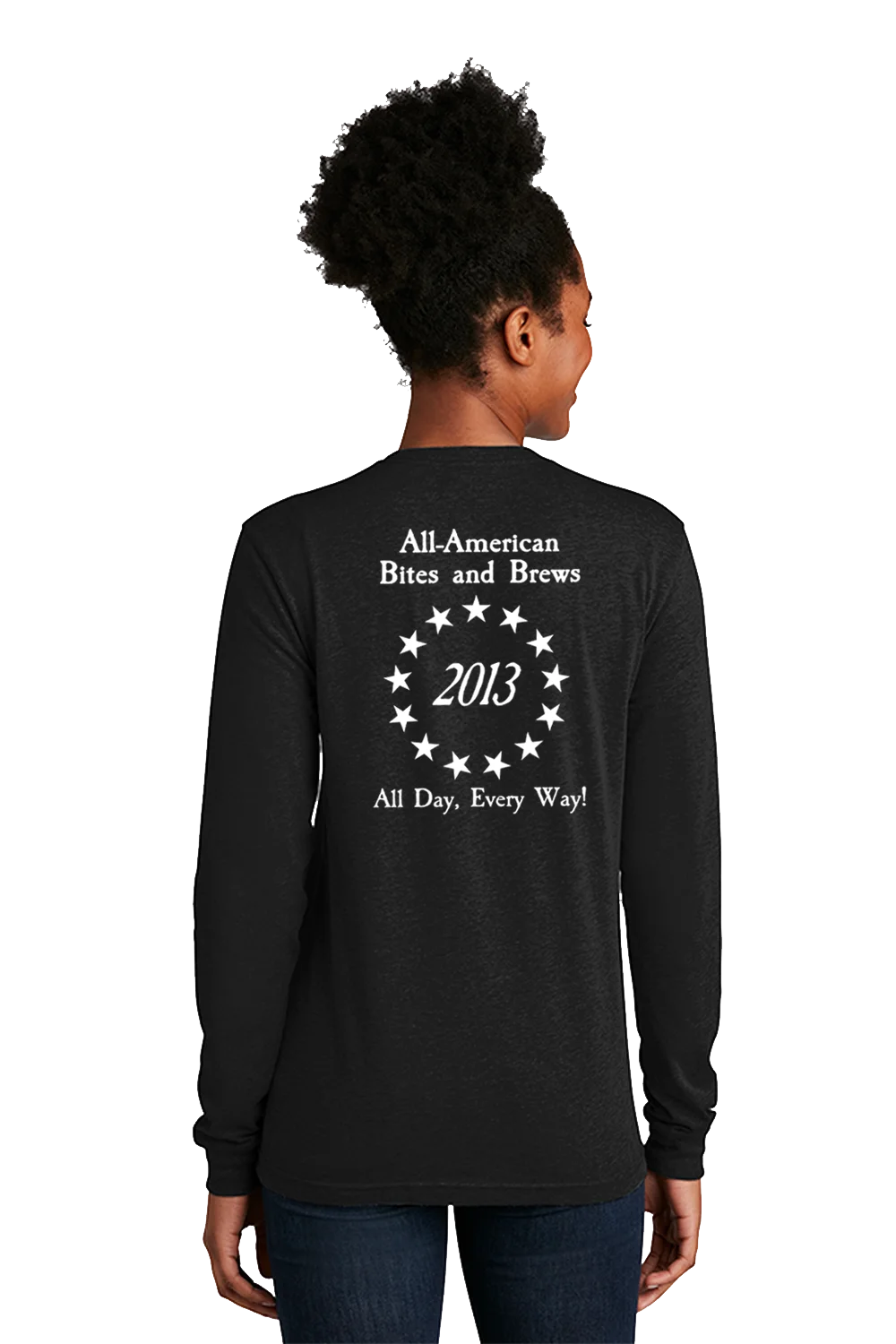 Person wearing a black long-sleeve shirt with text on the back, standing against a white background. Paper Street Print Co, Blairstown, NJ,