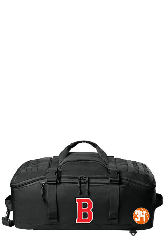 A black duffel bag with a large red letter 'B' on the front and an orange circular '31' patch on the side, shown against a plain white background. Belvidere Lady Seaters, Paper Street Print Co, Blairstown, NJ.