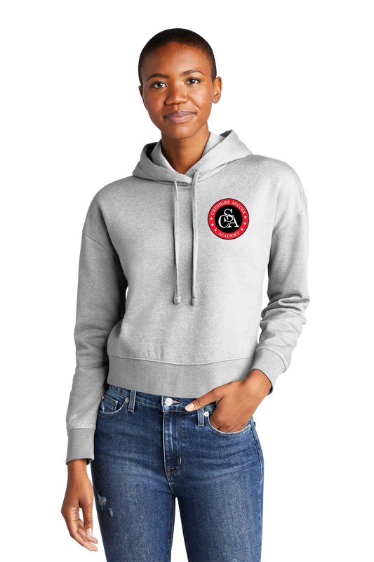 Person wearing a gray hoodie with a logo on a white background. Paper Street Print Co, Blairstown, NJ.