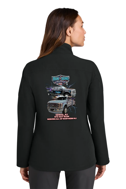 Person wearing a black jacket with a graphic design on the back, standing against a white background. Ron and Sons Towing, Paper Street Print Co, Blairstown, NJ.