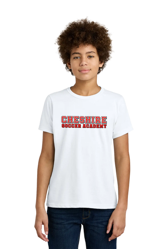 Person wearing a white t-shirt with 'Cheshire Soccer Academy' text on a white background. Paper Street Print Co, Blairstown, NJ.