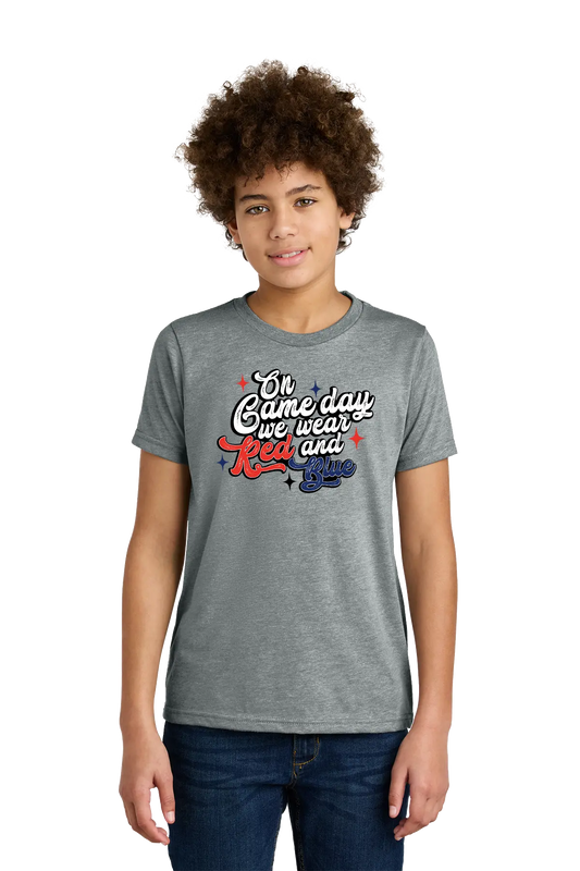 Person wearing a gray t-shirt with colorful text design on a white background. Paper Street Print Co, Blairstown, NJ.