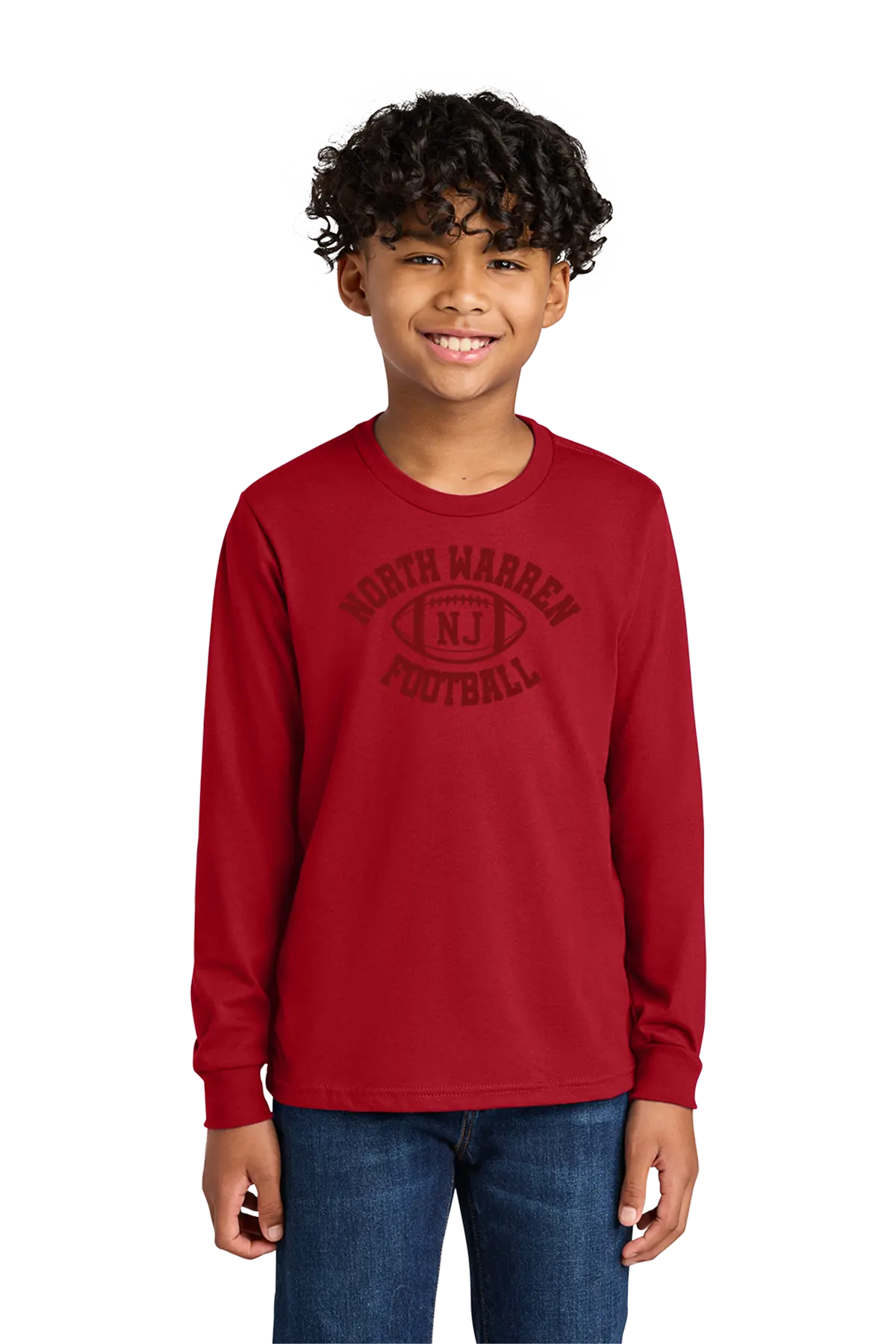 Child wearing a red long-sleeve shirt with 'North Warren Football' text on a white background. Paper Street Print Co, Blairstown, NJ.
