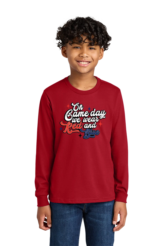 Child wearing a red long-sleeve shirt with text on a white background. Paper Street Print Co, Blairstown, NJ.
