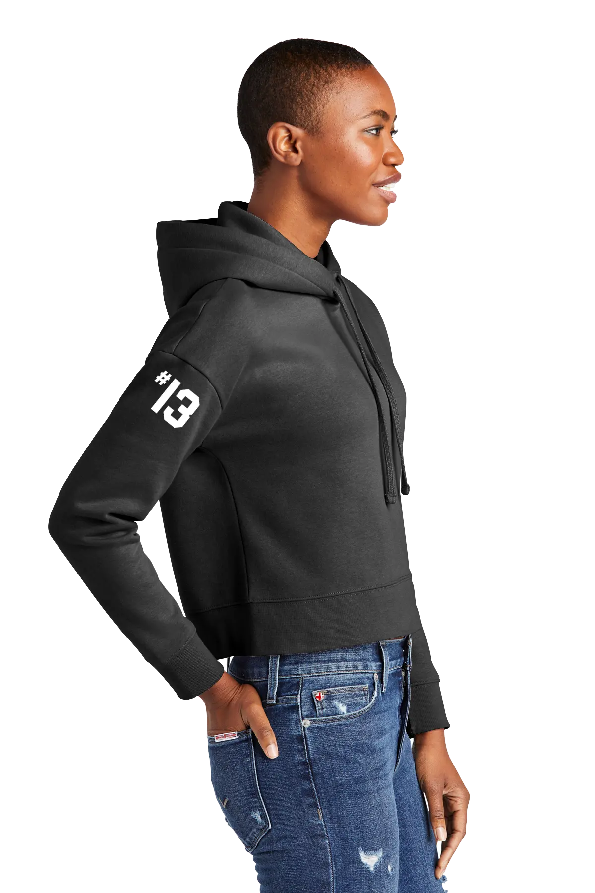 Person wearing a black hoodie with a white number '13' on the sleeve, standing against a white background. Paper Street Print Co, Blairstown, NJ.