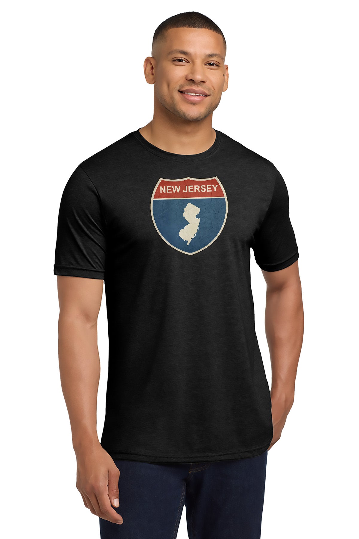 Man wearing a black t-shirt with a New Jersey graphic design on a white background - Paper Street Print Co, Blairstown, NJ