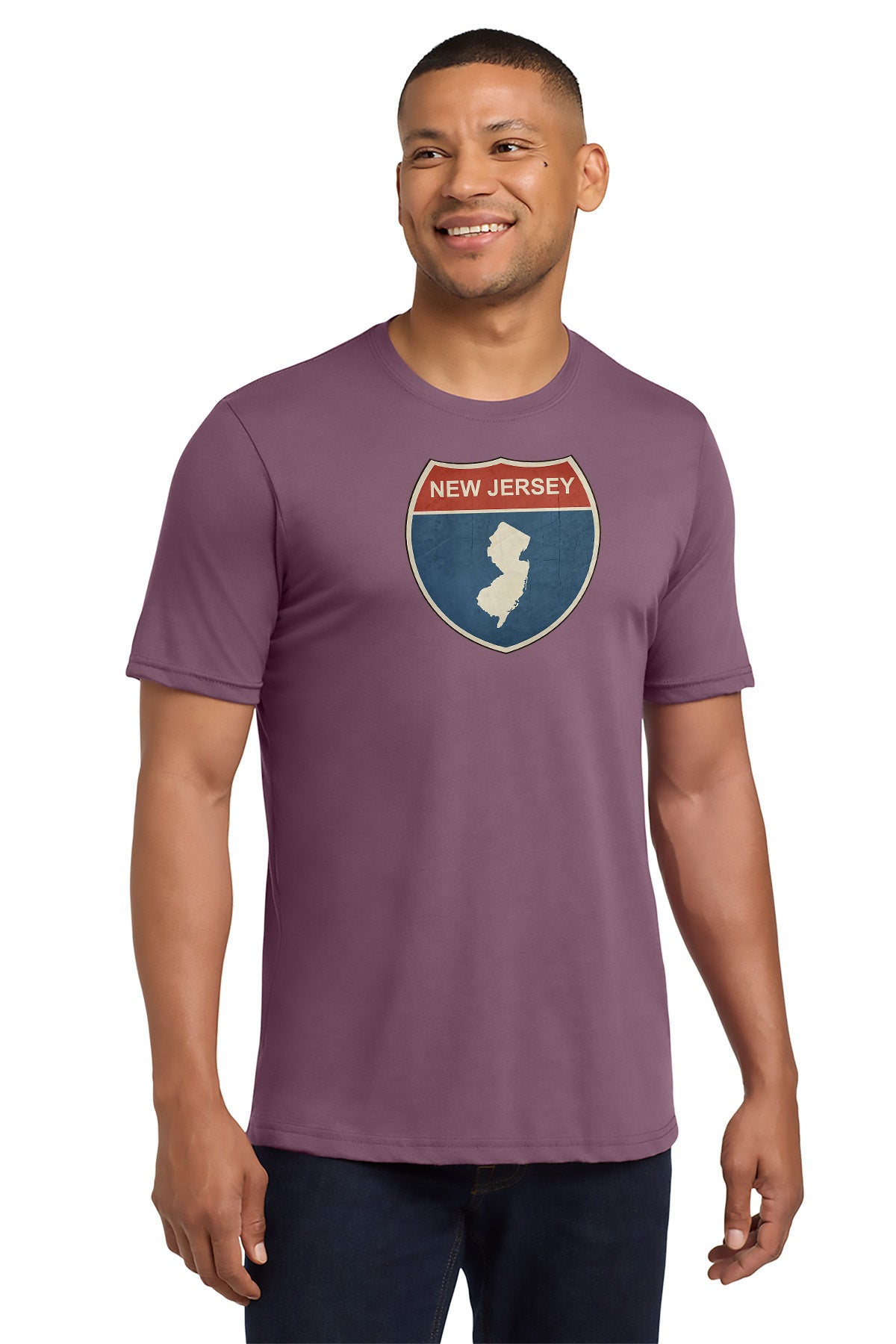 Man wearing a purple t-shirt with New Jersey graphic design on a white background - Paper Street Print Co, Blairstown, NJ
