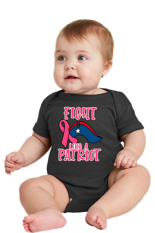 Baby wearing a black onesie with a pink and blue graphic and text. Paper Street Print Co, Blairstown, NJ.