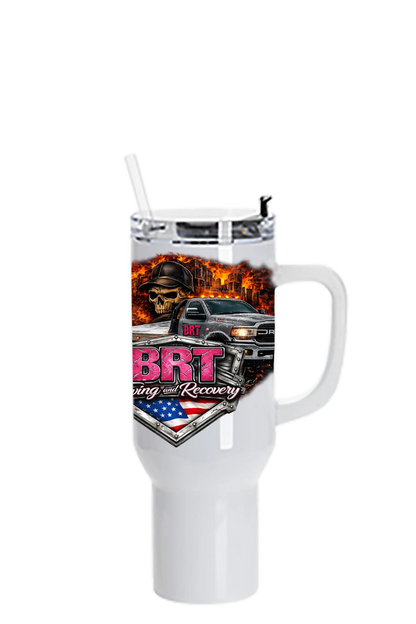White tumbler with a colorful design featuring a truck and skull, branded 'BRT'. BRT Towing and Recovery, Paper Street Print Co, Blairstown, NJ.