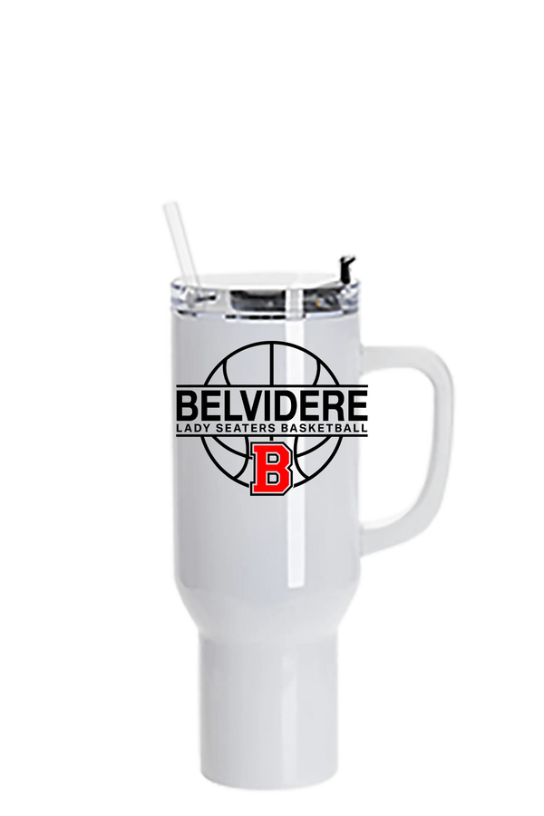 A white insulated travel tumbler with a handle and clear lid, featuring a black basketball graphic and the text 'BELVIDERE LADY SEATERS BASKETBALL' with a red 'B' logo on the front. Paper Street Print Co, Blairstown, NJ.