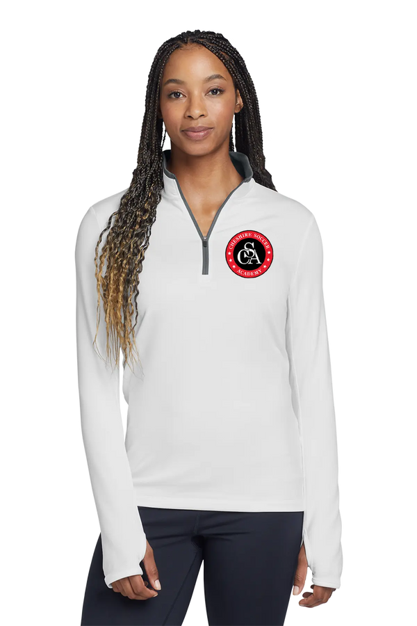Woman wearing a white pullover with a red and black logo on a white background. Paper Street Print Co, Blairstown, NJ.