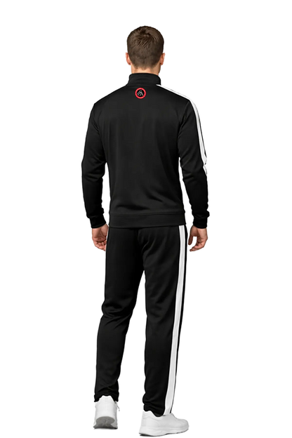 Man wearing a black tracksuit with white stripes on a white background. CSA Cheshire Soccer Academy, Paper Street Print Co, Blairstown, NJ.