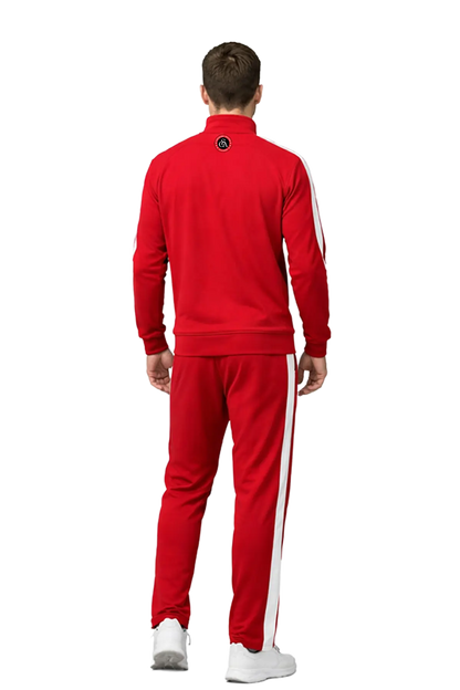 Man wearing a red tracksuit with white stripes on a white background. CSA Cheshire Soccer Academy, Paper Street Print Co, Blairstown, NJ.