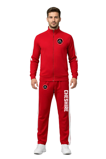 Man wearing a red tracksuit with 'Cheshire' branding on a white background. CSA Cheshire Soccer Academy, Paper Street Print Co, Blairstown, NJ.