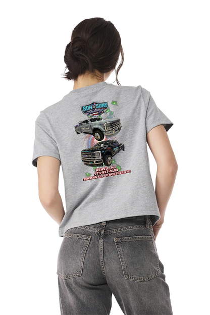Person wearing a gray t-shirt with graphic designs on the back, standing against a white background. Ron and Sons Towing, Paper Street Print Co, Blairstown, NJ.