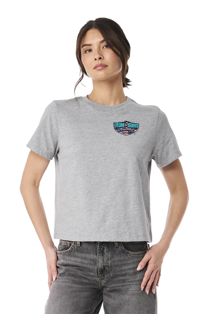 Woman wearing a gray t-shirt with a logo on a white background. Ron and Sons Towing, Paper Street Print Co, Blairstown, NJ.