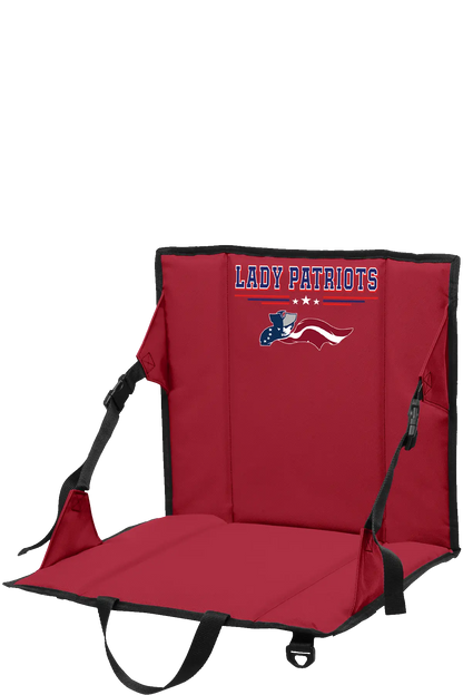 Red stadium seat with black straps on a white background. Paper Street Print Co, Blairstown, NJ.