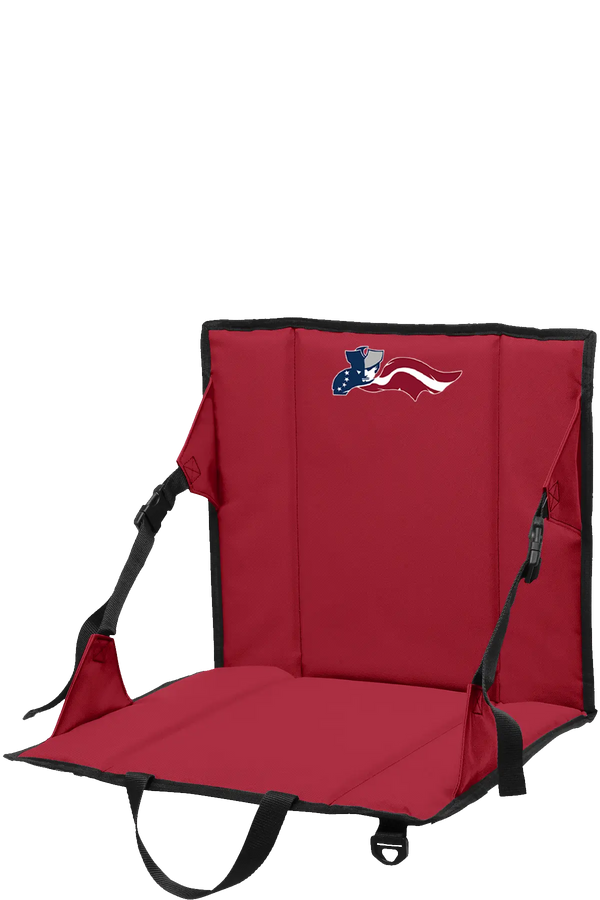 Red stadium seat with black straps on a white background. Paper Street Print Co, Blairstown, NJ.