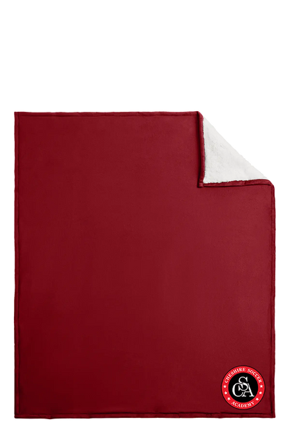 Red blanket with a logo on a white background. Paper Street Print Co, Blairstown, NJ.