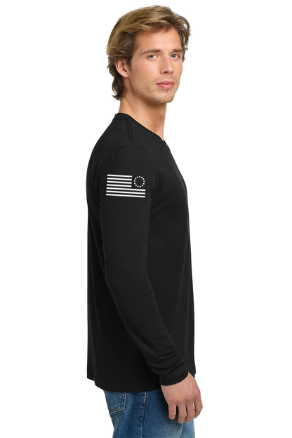 Man wearing a black long-sleeve shirt with a flag design on a white background. Paper Street Print Co, Blairstown, NJ,