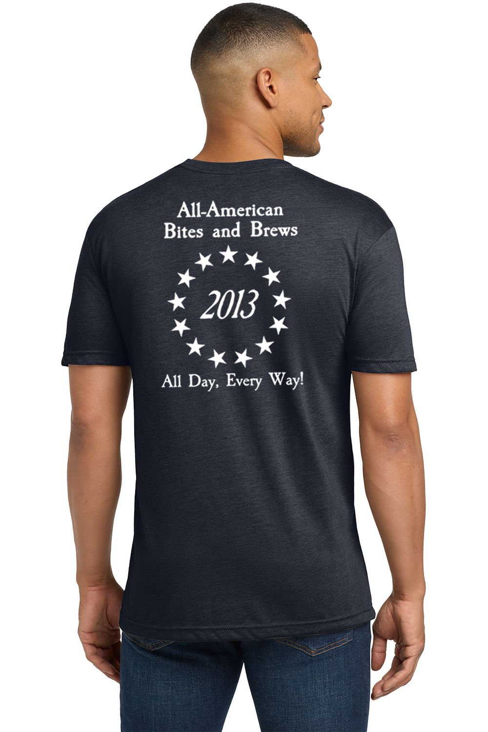 Man wearing a black t-shirt with white text on the back, standing against a white background. Paper Street Print Co, Blairstown, NJ.