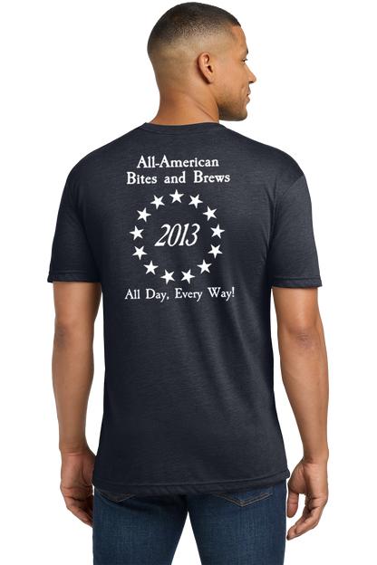 Man wearing a black t-shirt with white text on the back, standing against a white background. Paper Street Print Co, Blairstown, NJ.
