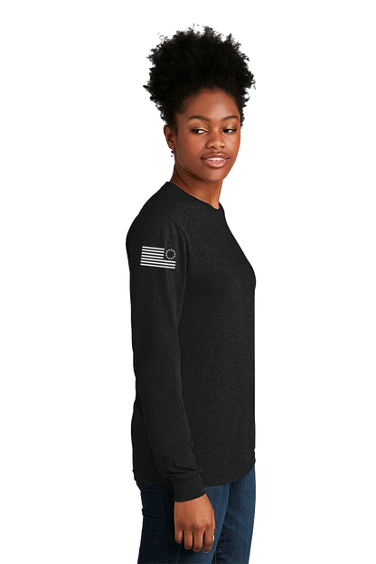 Person wearing a black long-sleeve shirt with a flag design on a white background. Paper Street Print Co, Blairstown, NJ,