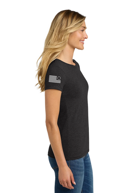 Woman wearing a black t-shirt with a flag design on a white background. Paper Street Print Co, Blairstown, NJ.