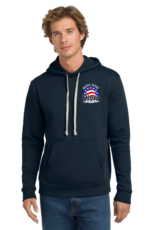 Man wearing a navy blue hoodie with a logo on a white background. Paper Street Print Co, Blairstown, NJ.