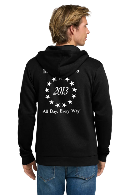Person wearing a black hoodie with white text and design on the back, standing against a white background. Paper Street Print Co, Blairstown, NJ,