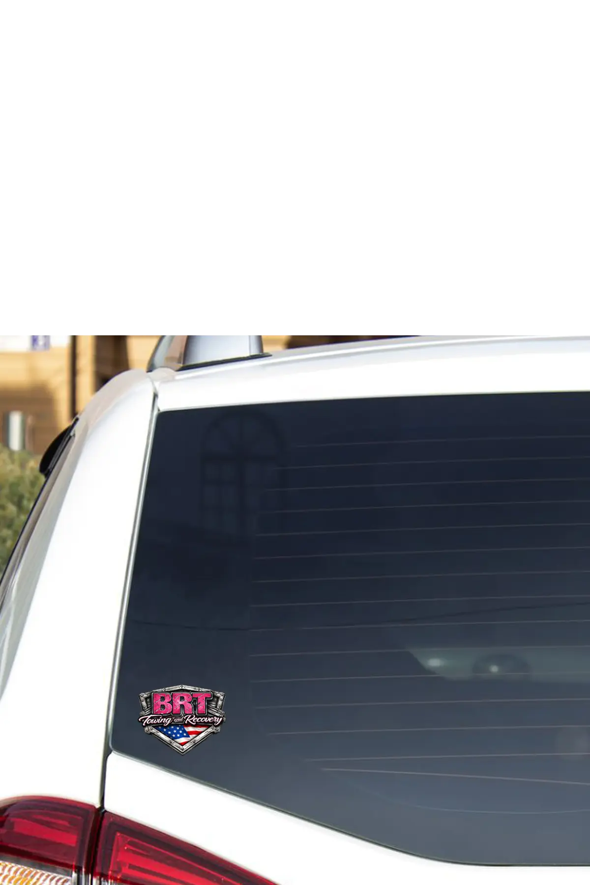 Car window with a BRT Towing and Recovery sticker. Paper Street Print Co, Blairstown, NJ.