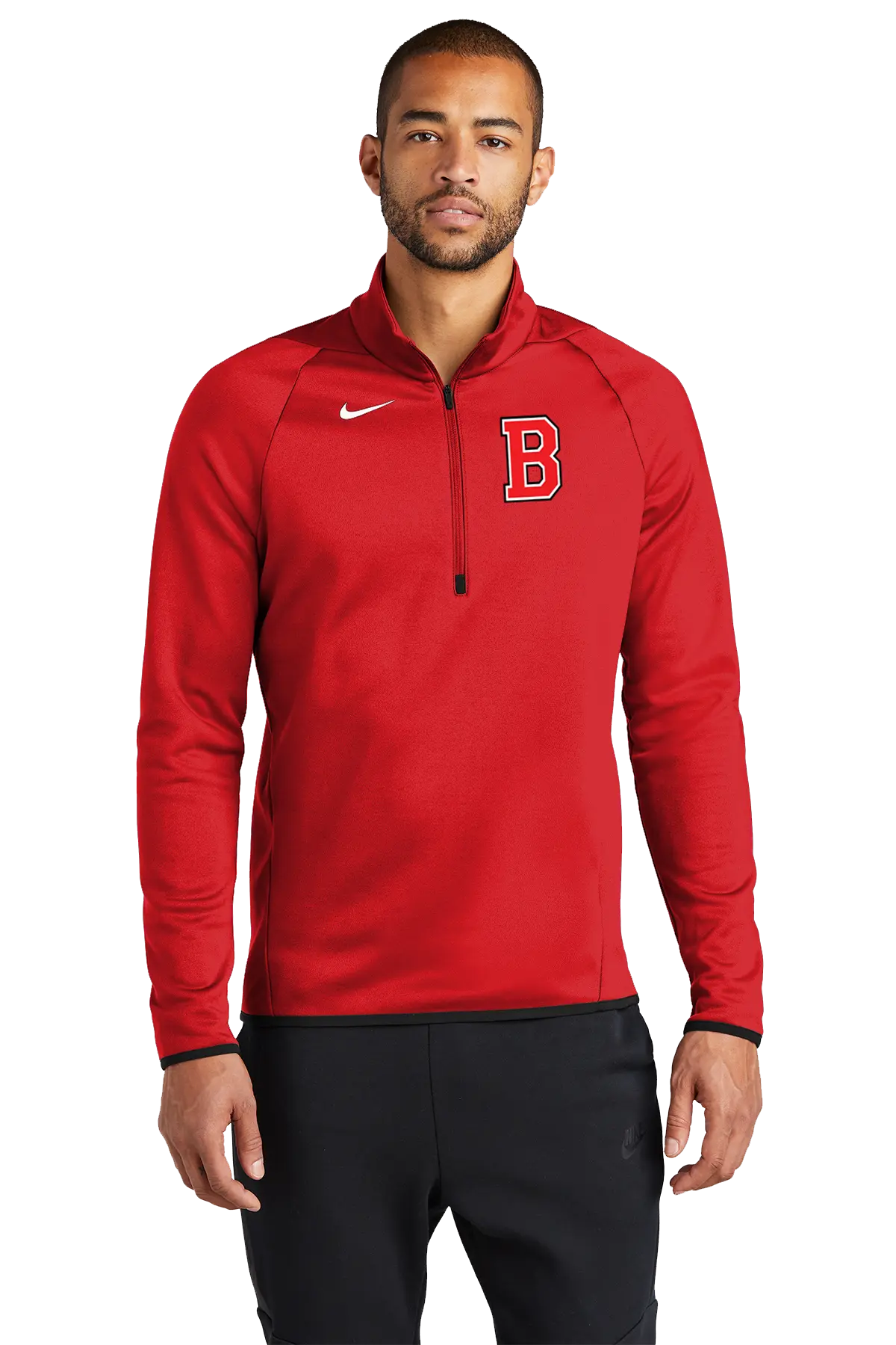 A man wearing a red Nike half-zip pullover with a white swoosh logo and a red letter 'B' on the chest, paired with black sweatpants, against a plain white background. Belvidere Lady Seaters Basketball, Paper Street Print Co, Blairstown, NJ.