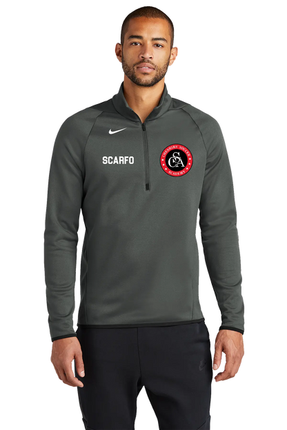 Man wearing a gray Nike pullover with logos on a white background. Paper Street Print Co, Blairstown, NJ.