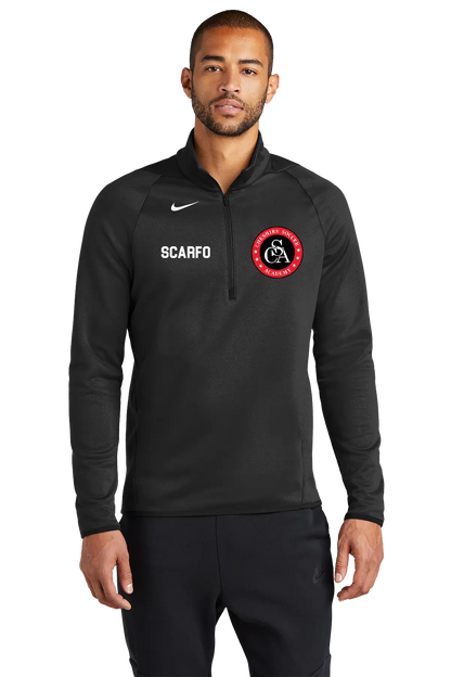 Man wearing a black Nike pullover with logos on a white background. Paper Street Print Co, Blairstown, NJ.