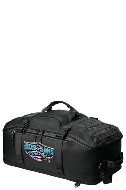 Black tactical bag with visible branding on a white background. Ron and Sons Towing, Paper Street Print Co, Blairstown, NJ.