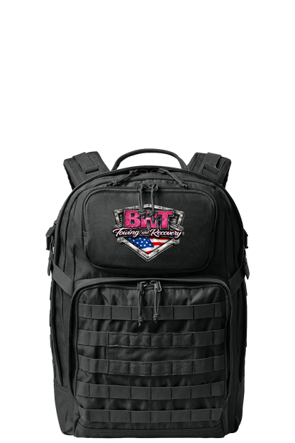 Black tactical backpack with a logo on a white background. BRT Towing & Recovery, Paper Street Print Co, Blairstown, NJ.