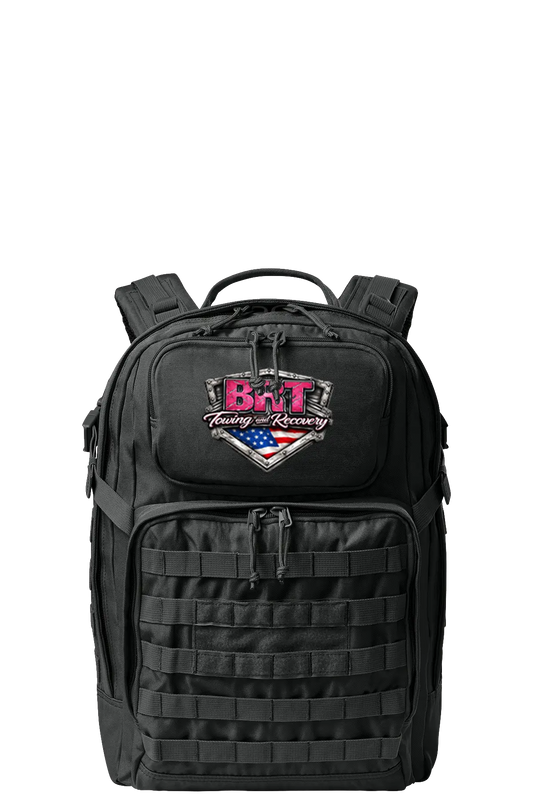 Black tactical backpack with a logo on a white background. BRT Towing & Recovery, Paper Street Print Co, Blairstown, NJ.