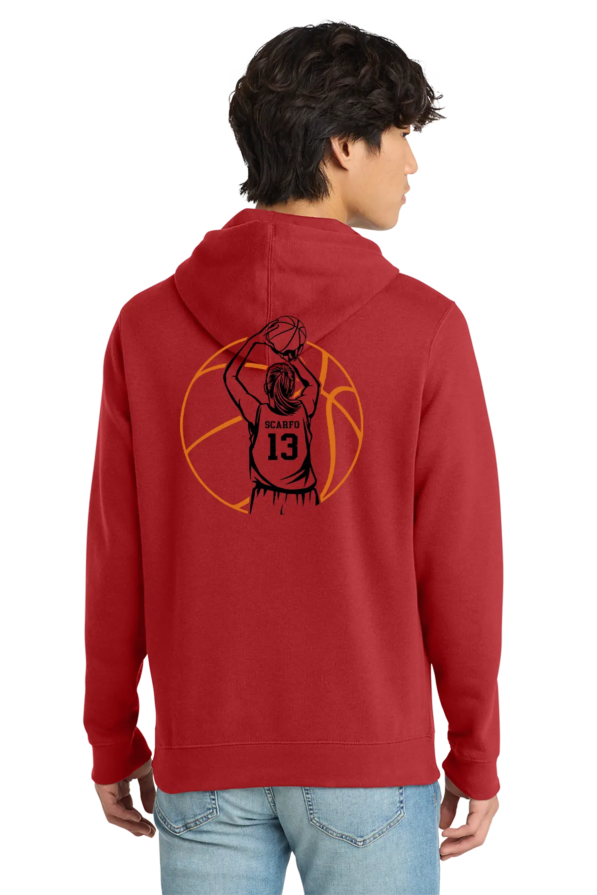 A man wearing a red pullover hoodie with a black and orange basketball graphic on the back, shown from behind against a plain white background. Belvidere Lady Seaters, Paper Street Print Co, Blairstown, NJ.