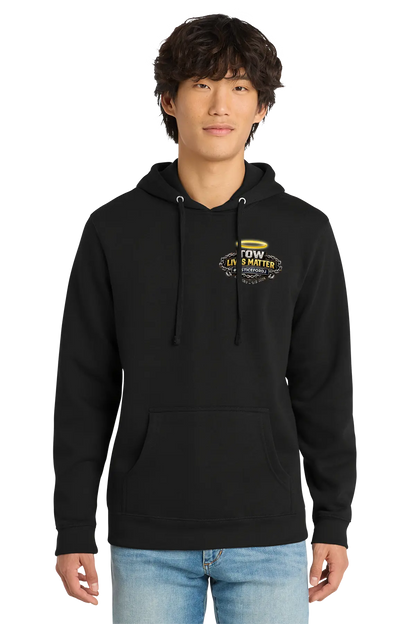 Person wearing a black hoodie with a graphic design on a white background. #JUSTICEFORDJ - Paper Street Print Co, Blairstown, NJ.