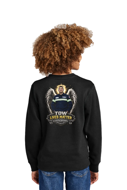 Person wearing a black sweatshirt with a graphic design on the back, standing against a white background. #JUSTICEFORDJ - Paper Street Print Co, Blairstown, NJ.