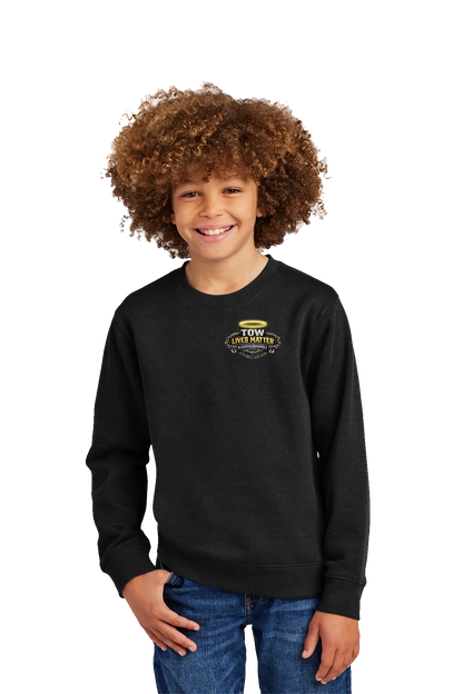 Child wearing a black long-sleeve shirt with a logo on a white background. #JUSTICEFORDJ - Paper Street Print Co, Blairstown, NJ.