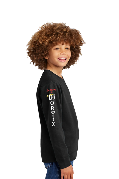 Child wearing a black sweatshirt with a logo and text on a white background. #JUSTICEFORDJ - Paper Street Print Co, Blairstown, NJ.