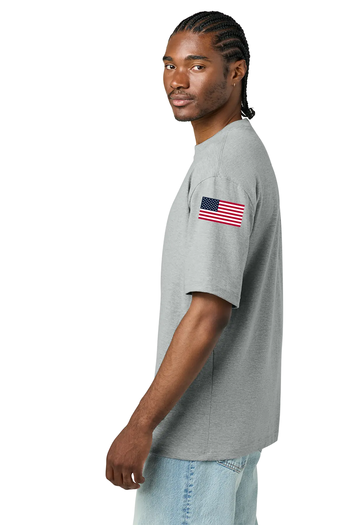 Man wearing a gray t-shirt with an American flag on a white background. BRT Towing and Recovery, Paper Street Print Co, Blairstown, NJ.