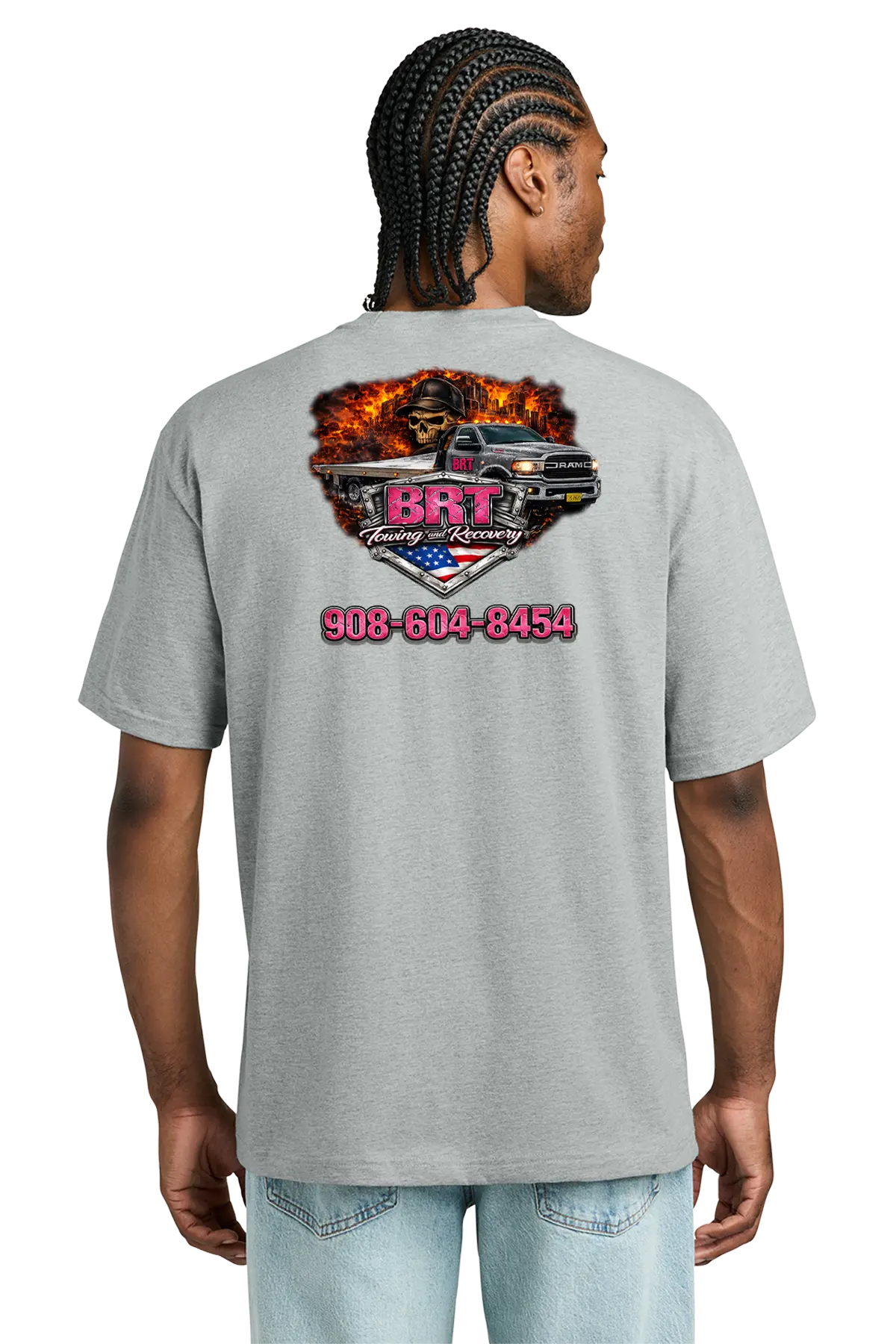 Person wearing a gray t-shirt with a graphic design on the back, featuring a phone number. BRT Towing and Recovery, Paper Street Print Co, Blairstown, NJ.