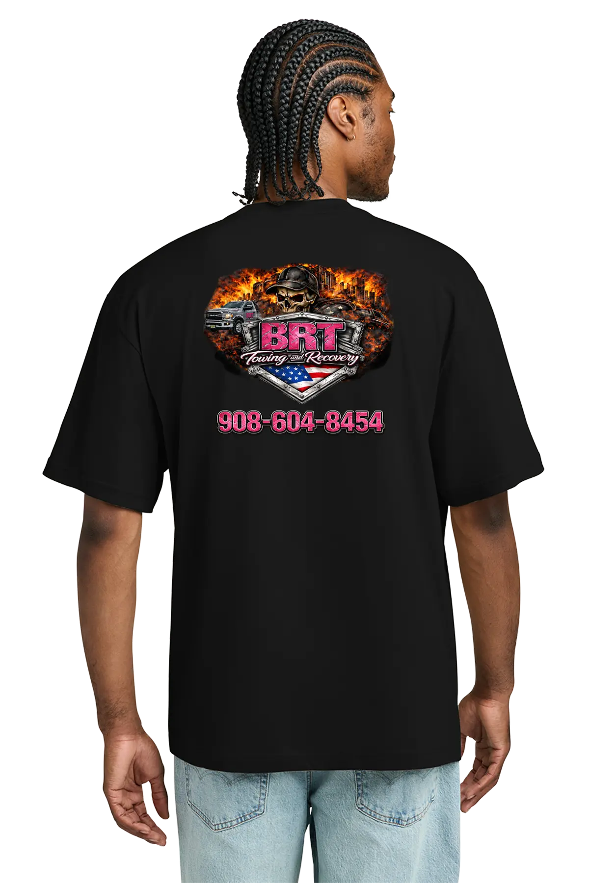 Person wearing a black t-shirt with a logo and text on the back, on a white background. BRT Towing and Recovery, Paper Street Print Co, Blairstown, NJ.