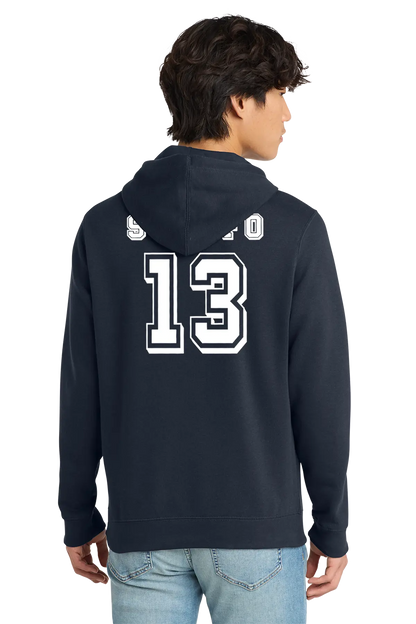 Person wearing a navy hoodie with the number 13 on the back, standing against a white background. Paper Street Print Co, Blairstown, NJ.