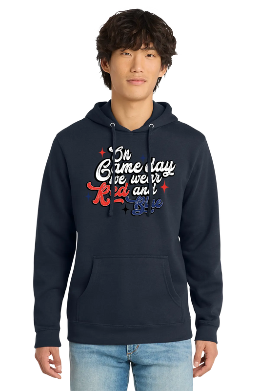 Person wearing a navy hoodie with colorful text design on a white background. Paper Street Print Co, Blairstown, NJ.